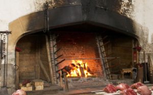 The word ‘backlog’ originally meant a large log at the back of the hearth.